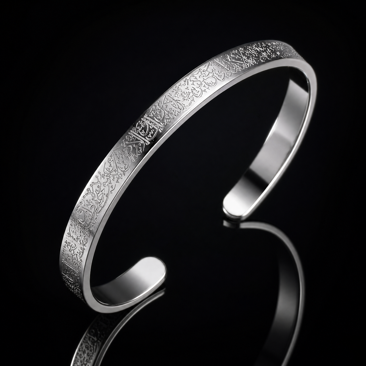 BRACELET AYAT EL KOURSI rim-lit on a black background