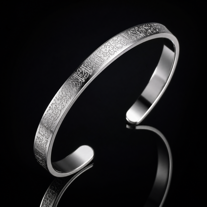 BRACELET AYAT EL KOURSI rim-lit on a black background